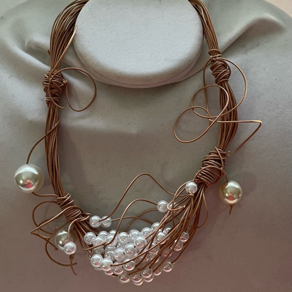 Necklace designer leather multistrand with pearls.